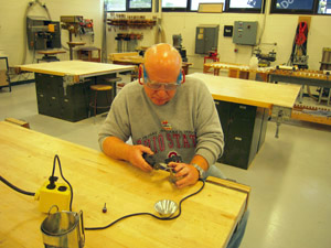 Cutting lantern door for hinges.